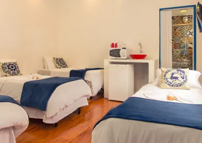 Quarto família da pousada em Oscar Freire São Paulo